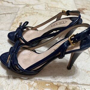 Prada Navy Strappy Heels with Bow and Gold Accents